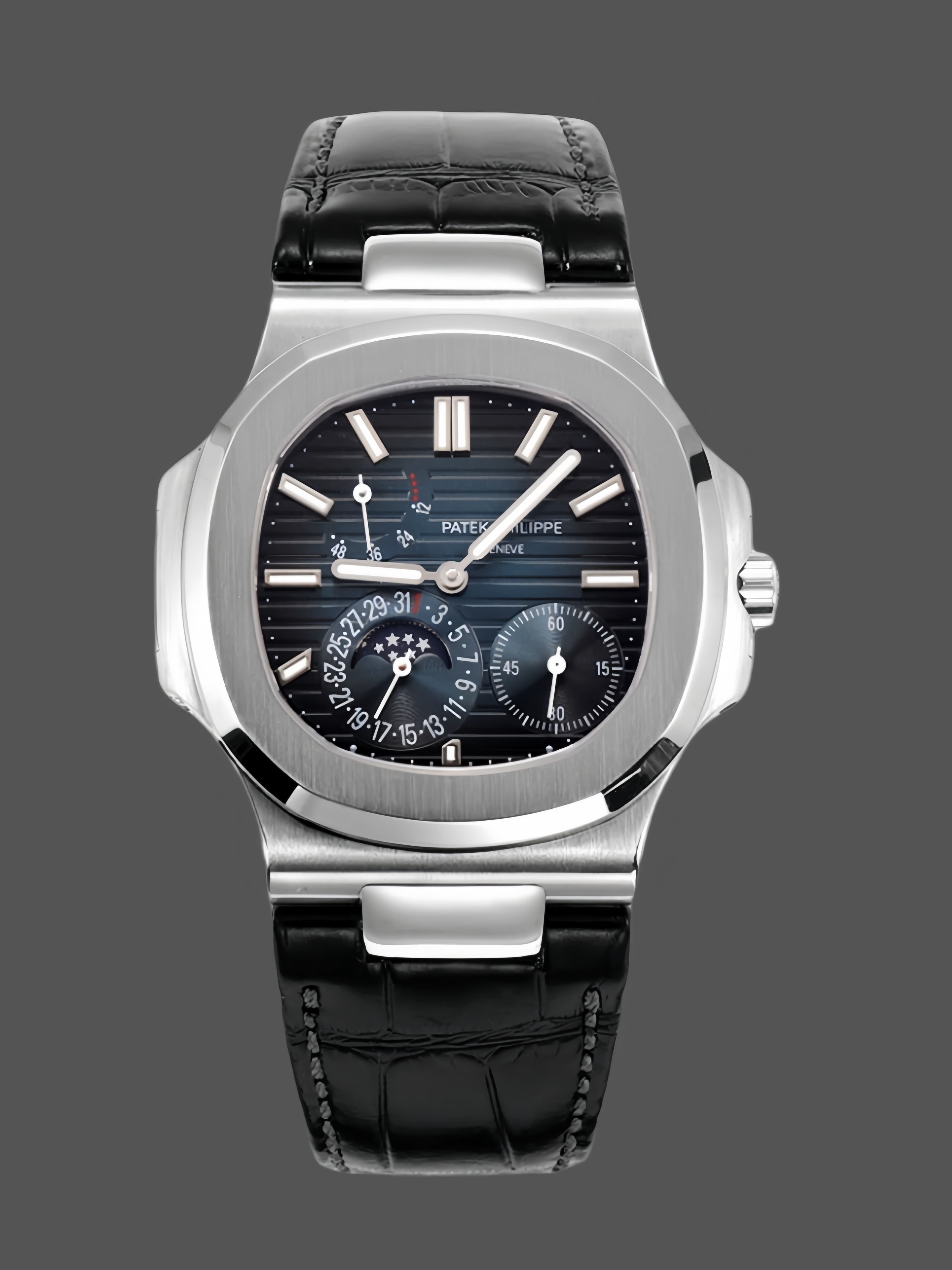 Patek Philippe Nautilus Moon Phases Rose & White Gold Slate Blue Sunburst 5712GR 001 — view 1
